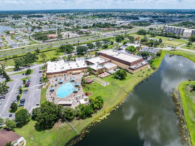 511 Foxglove Cir Unit B, Sun City Center, FL 33573 - aerial view of property and surrounding area with a nearby body of water and a pool area