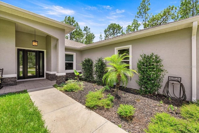 5352 W Corral Pl, Beverly Hills, FL 34465 - entrance to property featuring stucco siding and stone siding