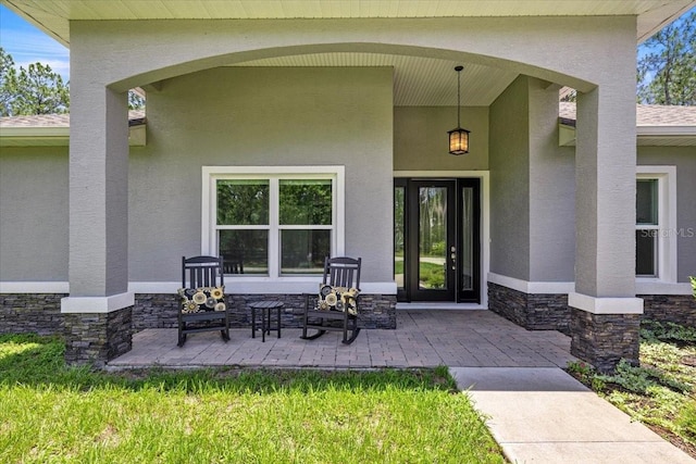 5352 W Corral Pl, Beverly Hills, FL 34465 - entrance to property featuring stone siding and stucco siding
