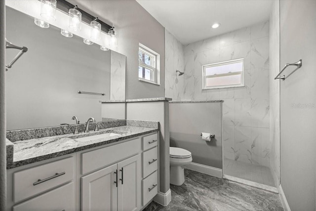 5352 W Corral Pl, Beverly Hills, FL 34465 - bathroom with marble look tiles, a marble finish shower, and vanity