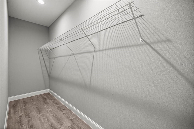 5352 W Corral Pl, Beverly Hills, FL 34465 - walk in closet featuring wood finished floors