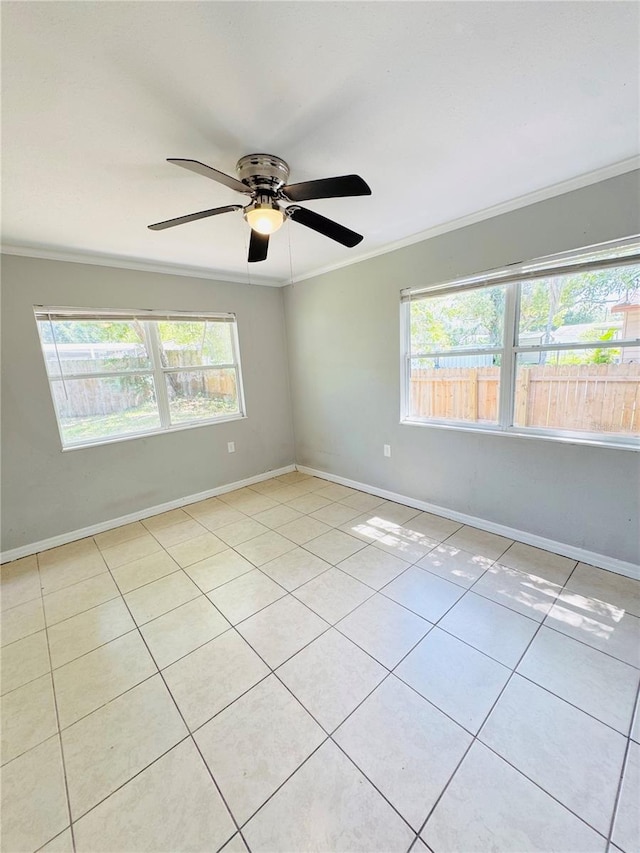 1507 W Le Compte Dr, Tampa, FL 33604 - tiled spare room with ornamental molding, healthy amount of natural light, and ceiling fan