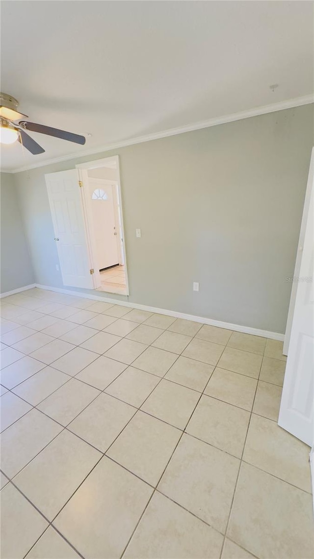 1507 W Le Compte Dr, Tampa, FL 33604 - empty room featuring crown molding, a ceiling fan, and light tile patterned floors