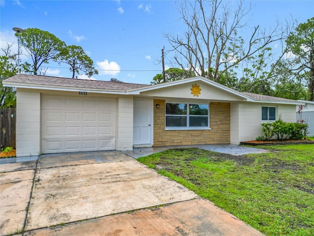 6632 Sierra Ter, New Port Richey, FL 34652 - single story home with a garage, driveway, and a shingled roof