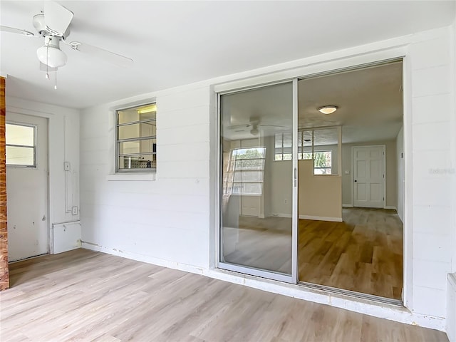 6632 Sierra Ter, New Port Richey, FL 34652 - spare room featuring ceiling fan and wood finished floors