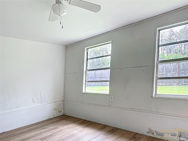 6632 Sierra Ter, New Port Richey, FL 34652 - spare room featuring wood finished floors and ceiling fan