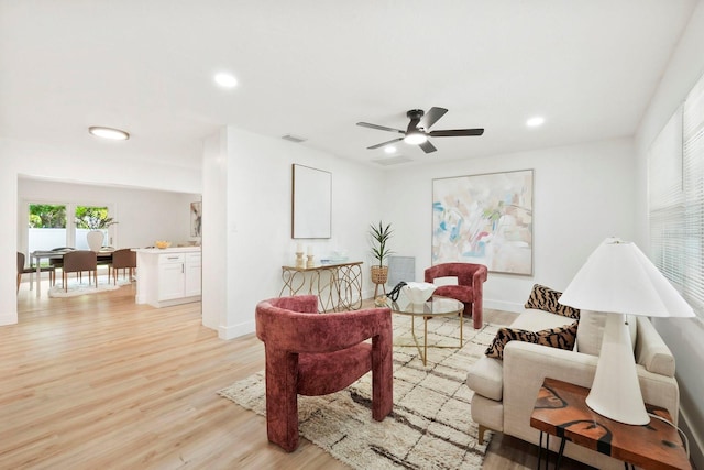 11779 82nd Ter, Seminole, FL 33772 - living area with light wood finished floors, recessed lighting, and ceiling fan