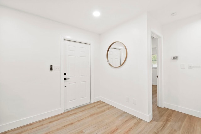 11779 82nd Ter, Seminole, FL 33772 - entryway with light wood finished floors and recessed lighting