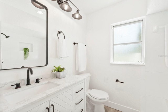 11779 82nd Ter, Seminole, FL 33772 - bathroom with vanity and wood finished floors