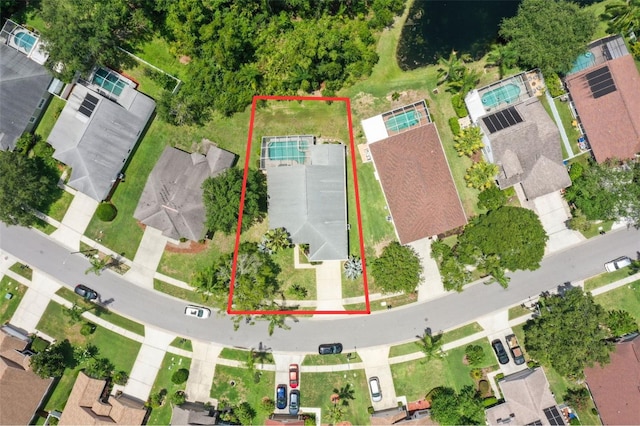 4948 Ridgemoor Cir, Palm Harbor, FL 34685 - aerial perspective of suburban area featuring property boundaries highlighted