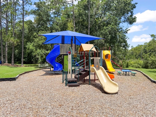 4948 Ridgemoor Cir, Palm Harbor, FL 34685 - communal playground featuring view of wooded area