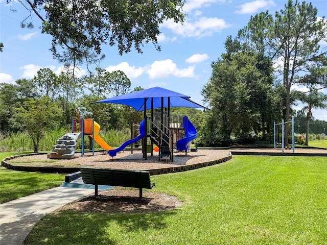 4948 Ridgemoor Cir, Palm Harbor, FL 34685 - community jungle gym featuring a lawn