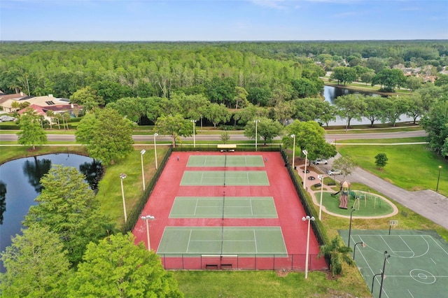 4948 Ridgemoor Cir, Palm Harbor, FL 34685 - drone / aerial view of a heavily wooded area and a large body of water