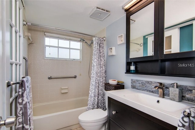 6932 Stones Throw Cir N Unit 7101, Saint Petersburg, FL 33710 - full bath with shower / bath combo with shower curtain and vanity