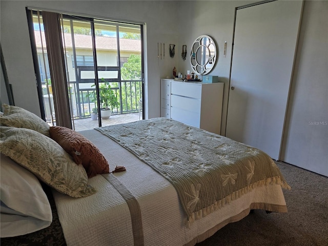 5925 Terrace Park Dr N Unit 210, Saint Petersburg, FL 33709 - bedroom with carpet flooring and access to outside