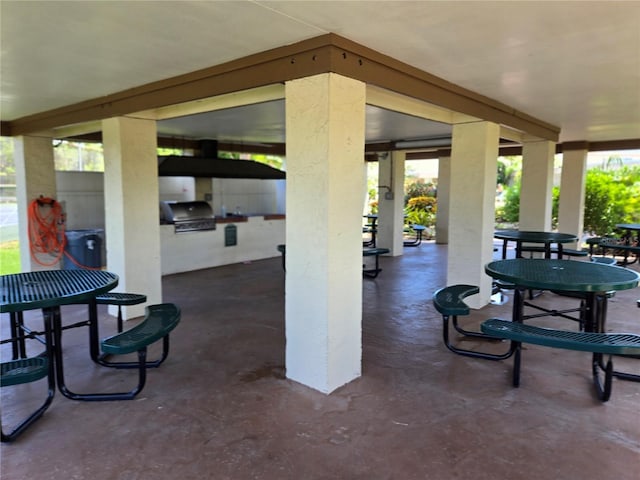 5925 Terrace Park Dr N Unit 210, Saint Petersburg, FL 33709 - view of patio featuring exterior kitchen