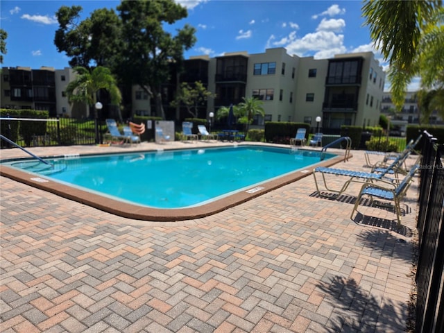 5925 Terrace Park Dr N Unit 210, Saint Petersburg, FL 33709 - community pool with a patio
