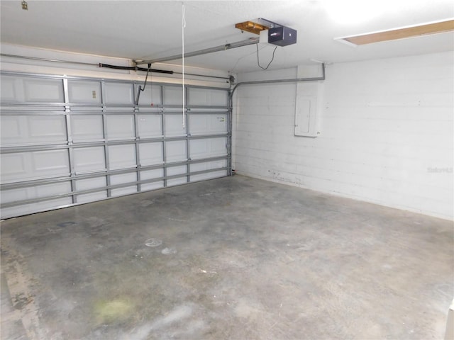 2114 Intervista Ln, Valrico, FL 33594 - garage featuring electric panel and a garage door opener