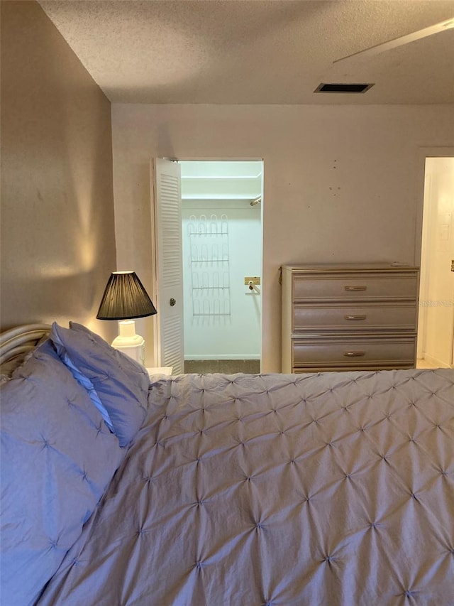 5623 80th St N Unit 314, Saint Petersburg, FL 33709 - bedroom with a textured ceiling