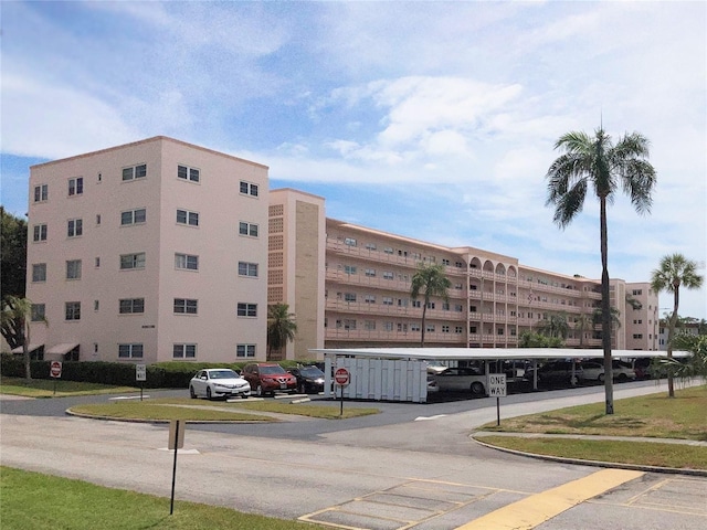 5623 80th St N Unit 314, Saint Petersburg, FL 33709 - view of apartment building / complex with covered and uncovered parking