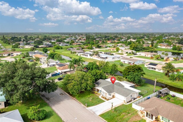 210 Jayview Ave, Lehigh Acres, FL 33936 - aerial view of residential area featuring a large body of water