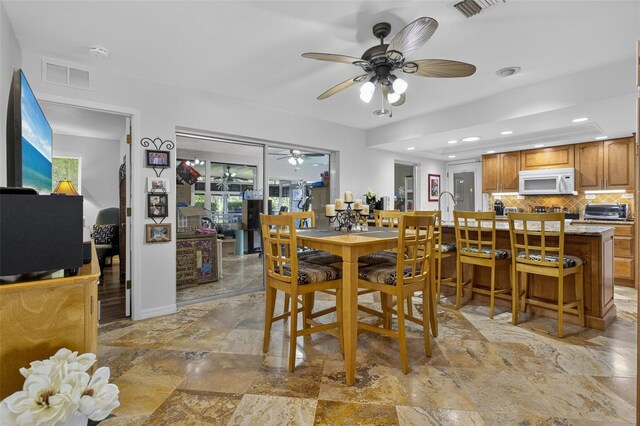 210 Jayview Ave, Lehigh Acres, FL 33936 - dining area featuring ceiling fan and recessed lighting
