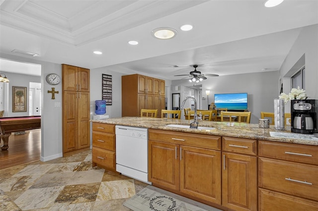 210 Jayview Ave, Lehigh Acres, FL 33936 - kitchen featuring dishwasher, brown cabinetry, ceiling fan, light stone countertops, and pool table