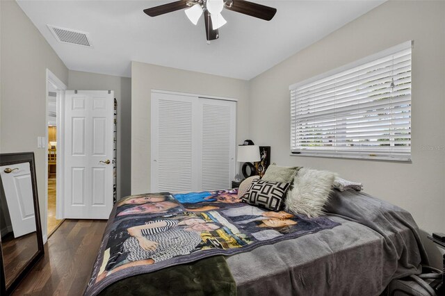 210 Jayview Ave, Lehigh Acres, FL 33936 - bedroom with dark wood-type flooring, a closet, and ceiling fan