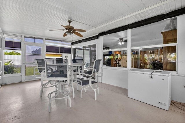 210 Jayview Ave, Lehigh Acres, FL 33936 - sunroom / solarium featuring a ceiling fan and outdoor dining area