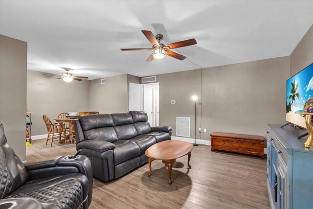 1485 Lakeview Rd Unit 2, Clearwater, FL 33756 - living area with ceiling fan and light wood-type flooring