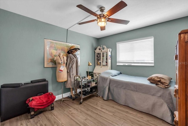 1485 Lakeview Rd Unit 2, Clearwater, FL 33756 - bedroom with wood finished floors and a ceiling fan