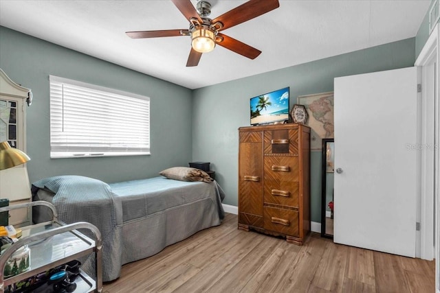 1485 Lakeview Rd Unit 2, Clearwater, FL 33756 - bedroom with wood finished floors and a ceiling fan