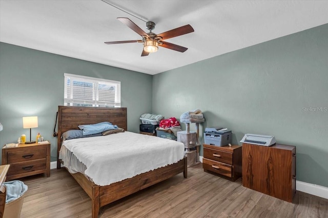 1485 Lakeview Rd Unit 2, Clearwater, FL 33756 - bedroom with wood finished floors and a ceiling fan