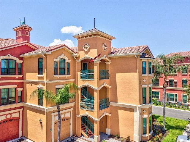 2733 Via Cipriani Unit 830B, Clearwater, FL 33764 - view of property with an attached garage