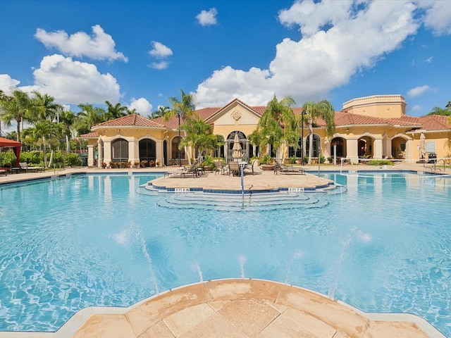 2733 Via Cipriani Unit 830B, Clearwater, FL 33764 - community pool with a patio area