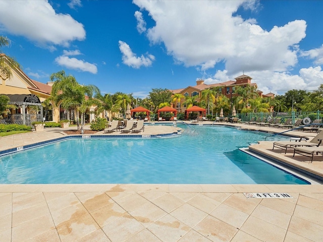 2733 Via Cipriani Unit 830B, Clearwater, FL 33764 - community pool with a patio area