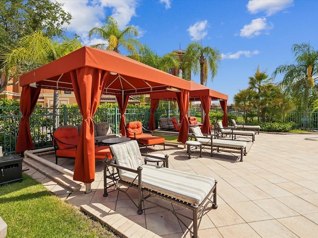 2733 Via Cipriani Unit 830B, Clearwater, FL 33764 - view of community with a gazebo and a patio area