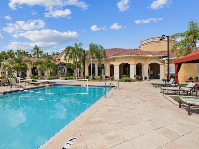 2733 Via Cipriani Unit 830B, Clearwater, FL 33764 - community pool featuring a patio area