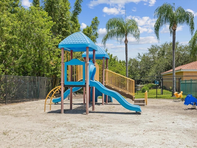 2733 Via Cipriani Unit 830B, Clearwater, FL 33764 - communal playground with view of scattered trees