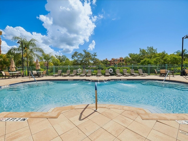 2733 Via Cipriani Unit 830B, Clearwater, FL 33764 - community pool with a patio area