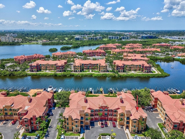 2733 Via Cipriani Unit 830B, Clearwater, FL 33764 - aerial perspective of suburban area featuring a large body of water