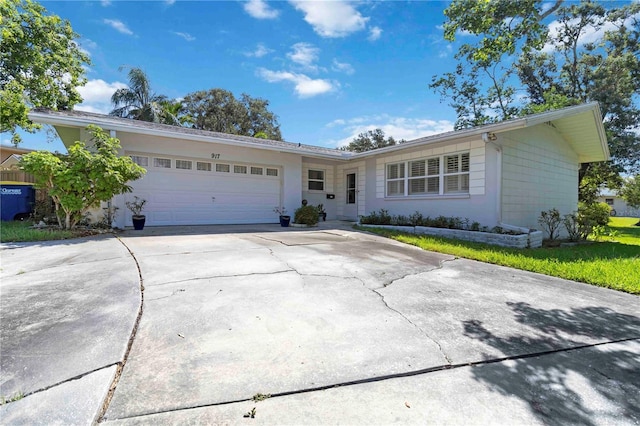 917 Pineview Ave, Clearwater, FL 33756 - single story home with an attached garage and driveway