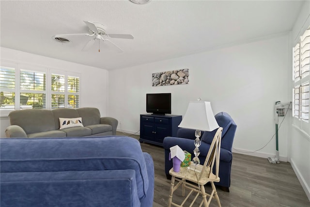 917 Pineview Ave, Clearwater, FL 33756 - living area with a ceiling fan and wood finished floors
