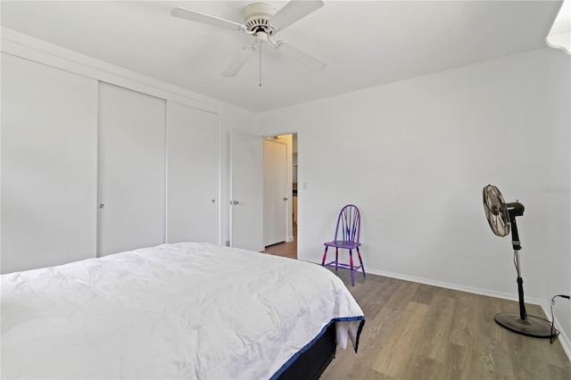 917 Pineview Ave, Clearwater, FL 33756 - bedroom with a closet, wood finished floors, and ceiling fan