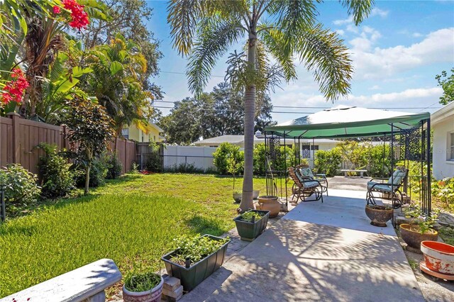 917 Pineview Ave, Clearwater, FL 33756 - fenced backyard with a gazebo and a patio