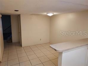 14442 Reuter Strasse Cir Unit 812, Tampa, FL 33613 - unfurnished room featuring light tile patterned floors