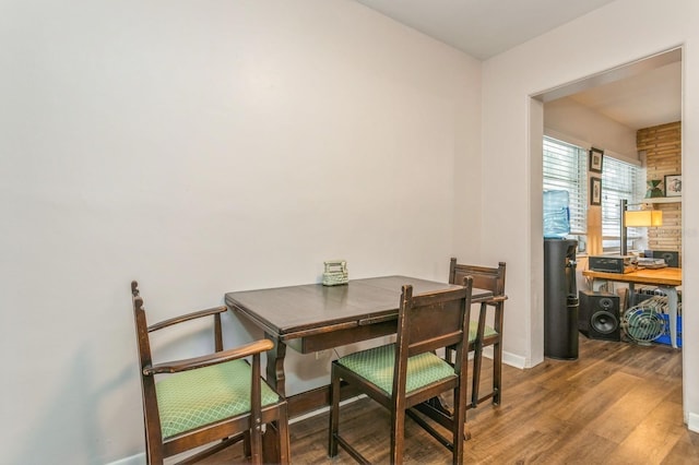 8014 27th Ave N, Saint Petersburg, FL 33710 - dining space featuring wood finished floors and baseboards