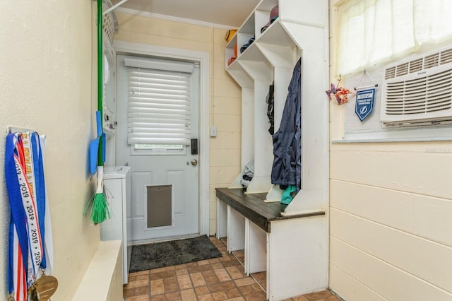 8014 27th Ave N, Saint Petersburg, FL 33710 - mudroom with brick patterned floors and ornamental molding