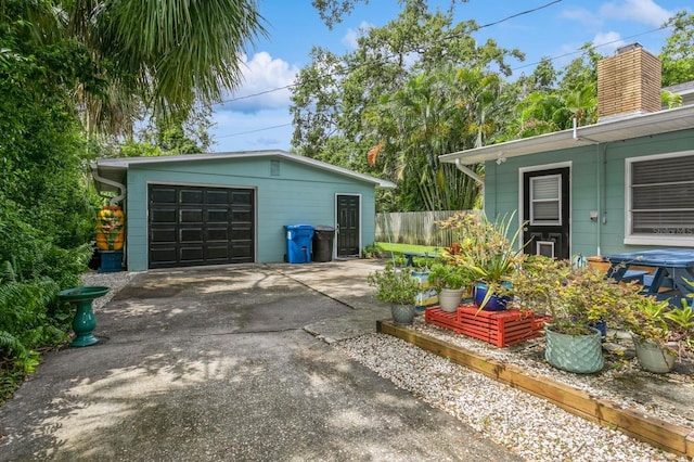 8014 27th Ave N, Saint Petersburg, FL 33710 - garage featuring driveway