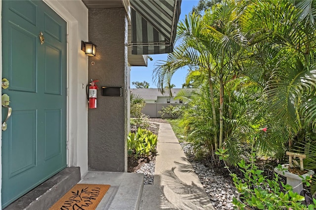 441 75th Ave N, Saint Petersburg, FL 33702 - entrance to property featuring stucco siding